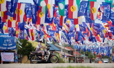 Elak kos berlebihan, hadkan pemasangan bendera dan sepanduk – Tun M